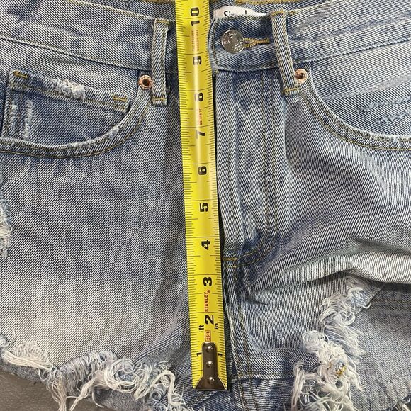 SIMPLE SOCIETY Denim Shorts Distressed Button Fly Raw Hem Y2K Womens 0 24 Blue - Picture 7 of 10